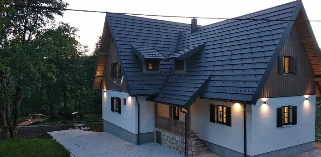 Plitvice Streaming guest house in Prijeboj at dusk
